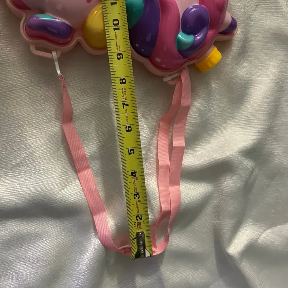 pink Pony water squirter backpack